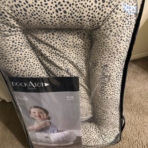 Large dock a tot like new condition brown and black